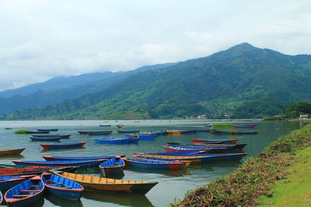 Pokhara known for its lush green hills and lake.